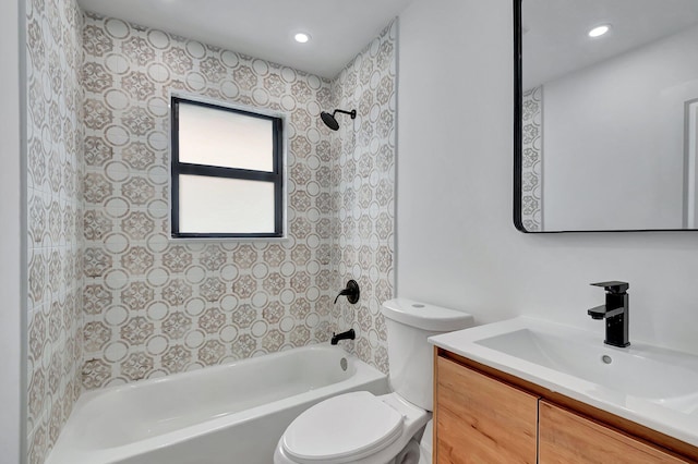 full bathroom featuring vanity, toilet, and washtub / shower combination