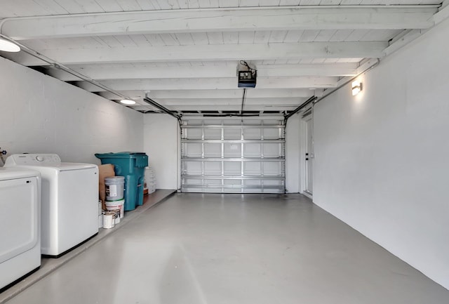 garage with a garage door opener, separate washer and dryer, and wood ceiling