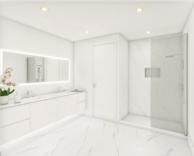 bathroom with vanity and a tile shower