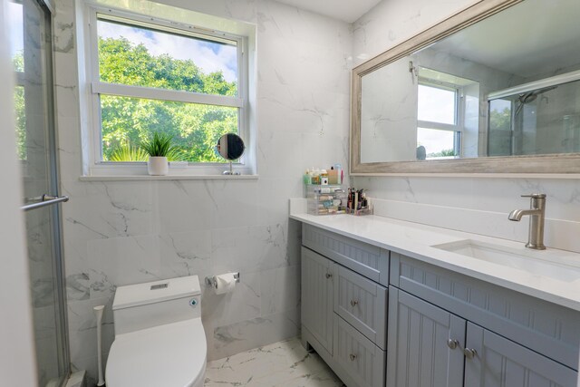 bathroom with hardwood / wood-style flooring and vanity