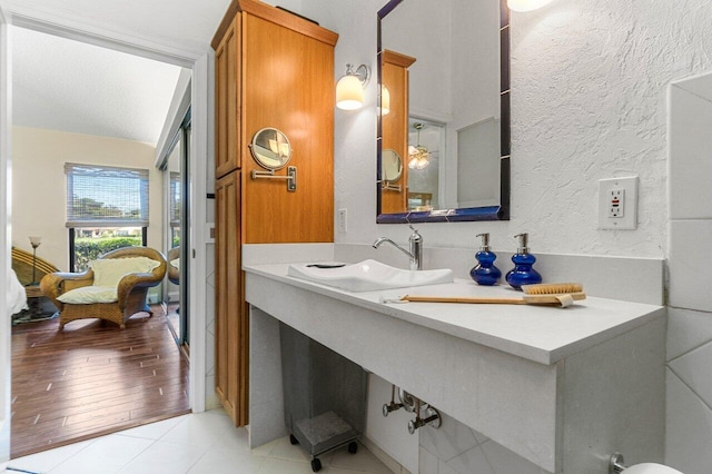 bathroom with sink and tile patterned floors