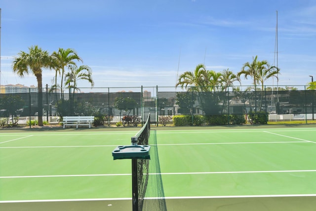 view of sport court with fence