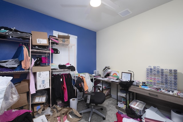 home office featuring carpet flooring and ceiling fan