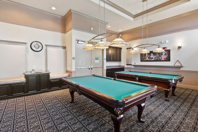 rec room with crown molding, billiards, a raised ceiling, and dark colored carpet