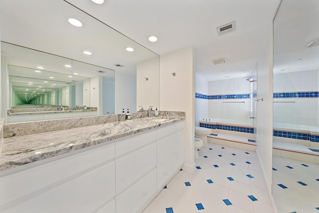 full bathroom with a bidet, vanity, tile patterned floors, independent shower and bath, and toilet