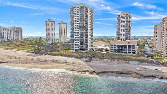 aerial view featuring a water view and a view of the beach