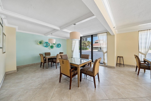 dining room with light tile patterned flooring, ornamental molding, and beam ceiling