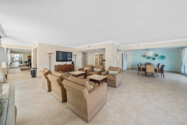 living room featuring light tile patterned floors and crown molding