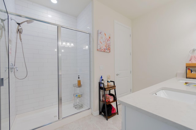 bathroom with vanity, tile patterned flooring, and a shower with shower door