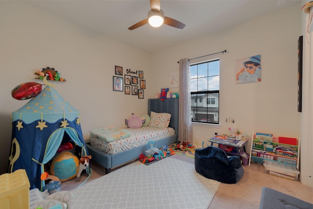 bedroom featuring ceiling fan and carpet flooring