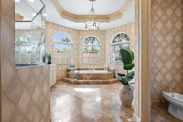 bathroom featuring a bidet, ornamental molding, tiled bath, and tile walls