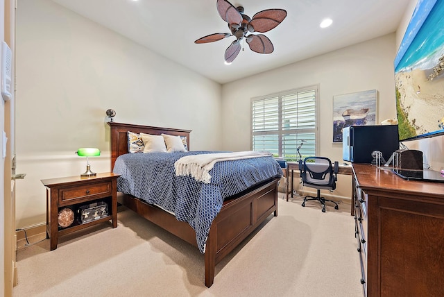 carpeted bedroom with ceiling fan