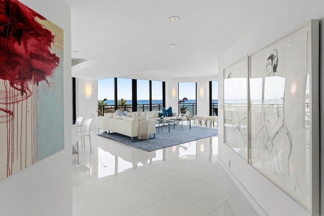 living room with recessed lighting and tile patterned flooring