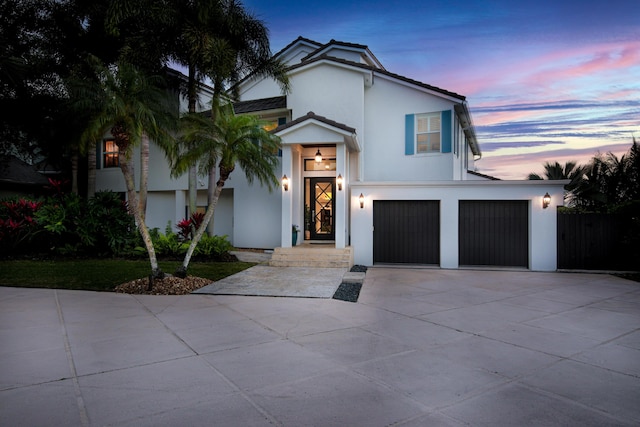 view of front of property with a garage