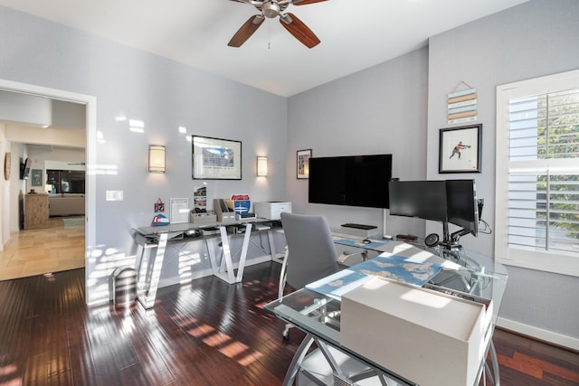 office space with ceiling fan and dark hardwood / wood-style flooring