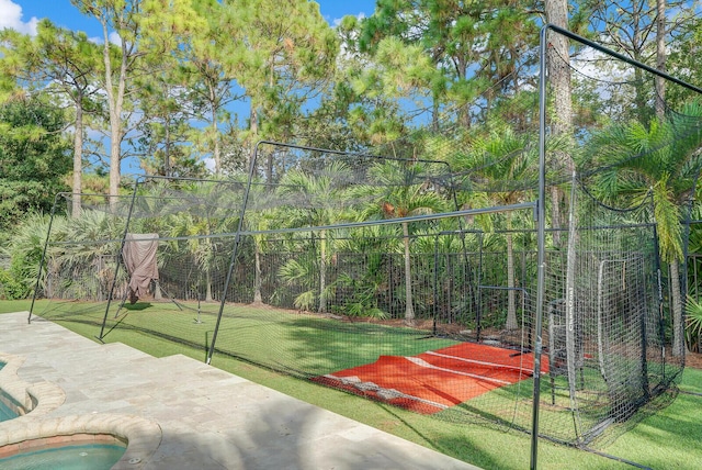 view of yard with basketball court