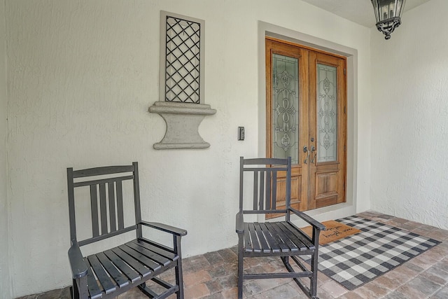 entrance to property featuring french doors