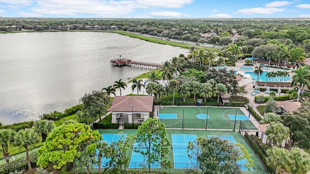 birds eye view of property featuring a water view