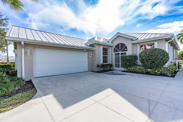 view of front of house with a garage