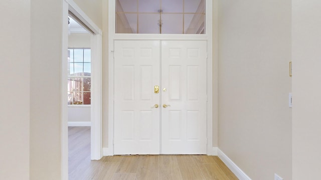 entrance foyer with light hardwood / wood-style flooring