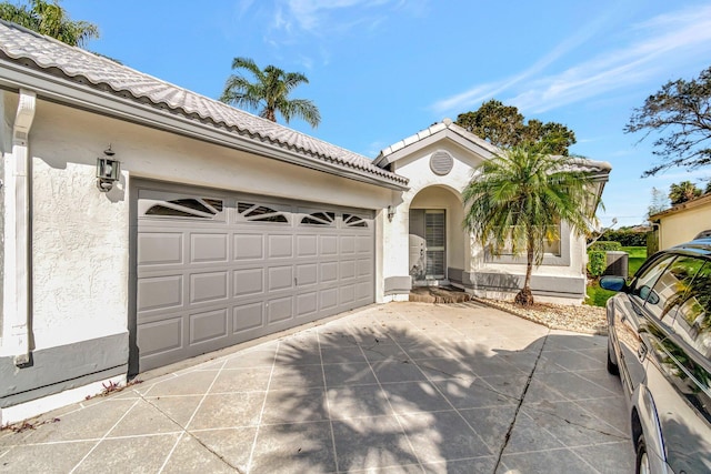 view of front of property featuring a garage