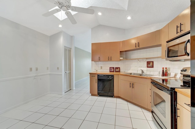 kitchen with light tile patterned flooring, sink, light brown cabinets, appliances with stainless steel finishes, and decorative backsplash