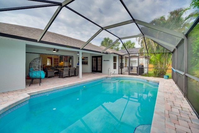 pool featuring an outdoor hangout area, a patio, and a lanai