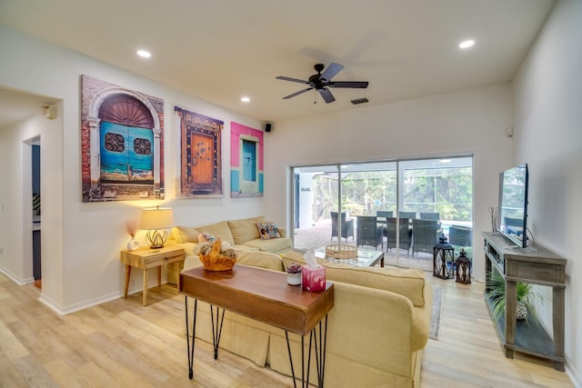 living room with recessed lighting, a ceiling fan, baseboards, visible vents, and light wood-style floors