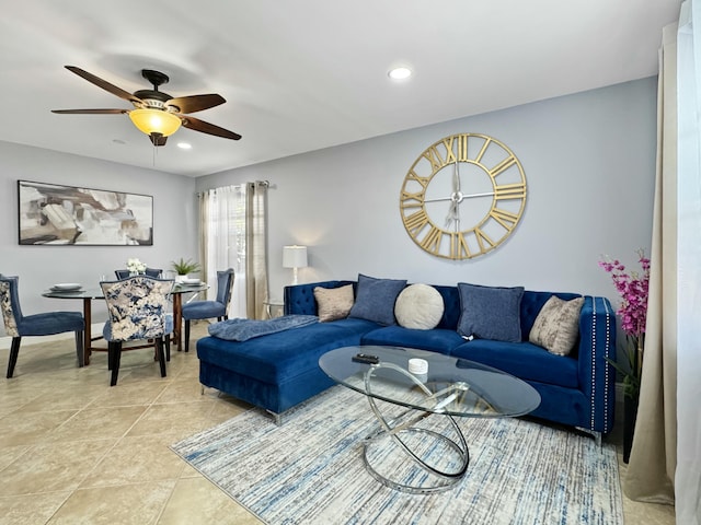 living area with light tile patterned flooring, recessed lighting, and a ceiling fan