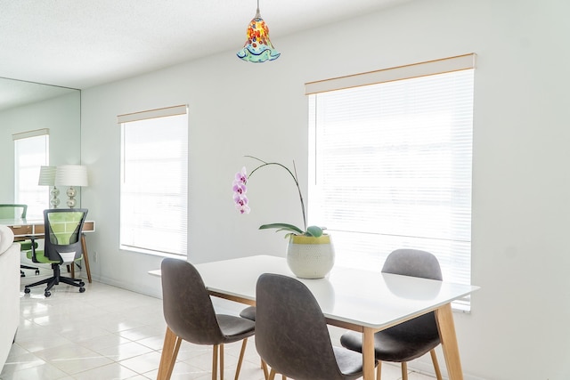 dining room with light tile patterned floors