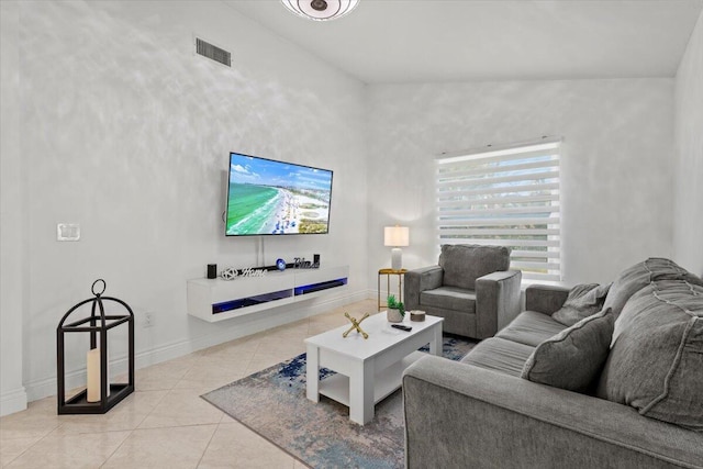 living room with light tile patterned flooring