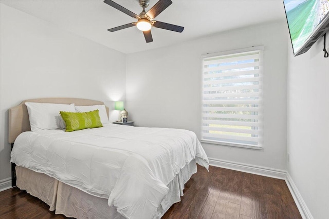 bedroom featuring dark hardwood / wood-style floors and ceiling fan