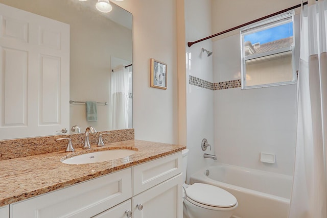 full bathroom featuring vanity, shower / bath combination with curtain, and toilet