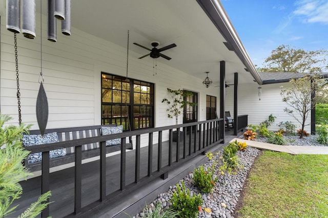 exterior space with covered porch and ceiling fan