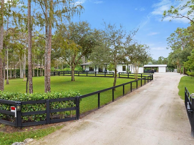 view of community featuring a lawn