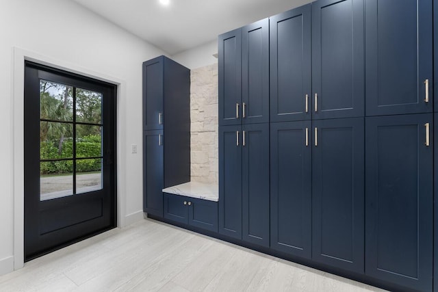 mudroom with light wood-type flooring