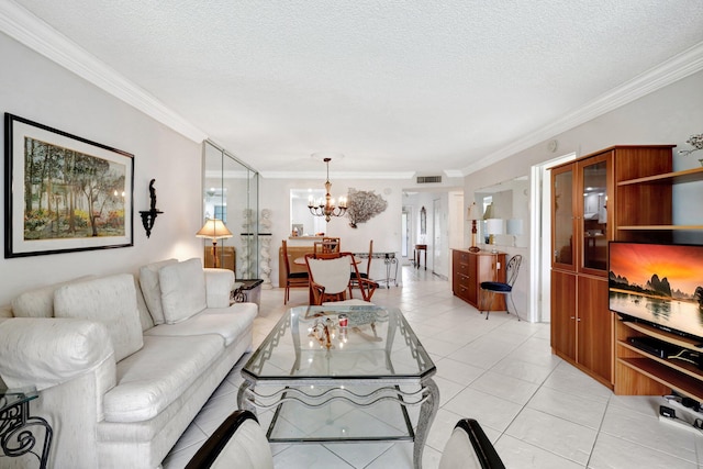 27 Abbey Ln Unit 205, Delray Beach, FL 33446 - living room featuring light tile patterned floors, crown molding, a notable chandelier, and a textured ceiling