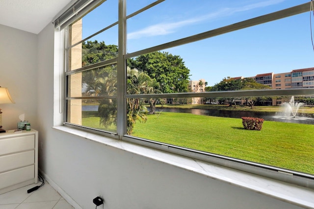 27 Abbey Ln Unit 205, Delray Beach, FL 33446 - interior space featuring a yard and a water view