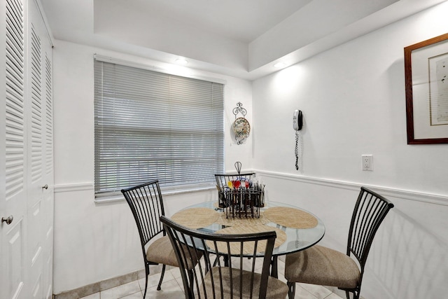 27 Abbey Ln Unit 205, Delray Beach, FL 33446 - dining space featuring light tile patterned floors