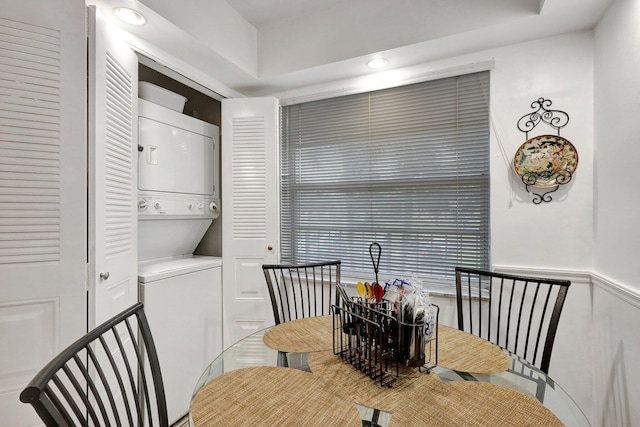 27 Abbey Ln Unit 205, Delray Beach, FL 33446 - dining area featuring stacked washer and dryer
