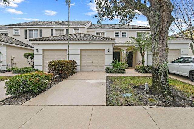 view of front of property featuring a garage