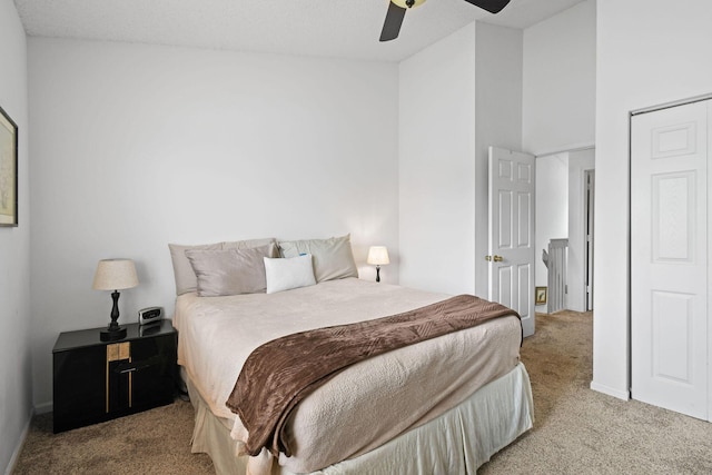 carpeted bedroom featuring ceiling fan