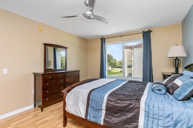 bedroom with ceiling fan and light wood-type flooring