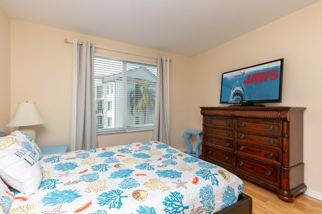 bedroom with light hardwood / wood-style floors