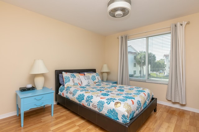 bedroom featuring light wood-type flooring