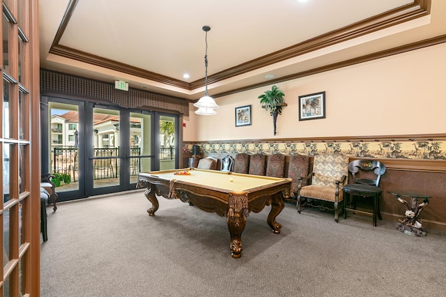 game room with carpet, ornamental molding, a raised ceiling, pool table, and french doors