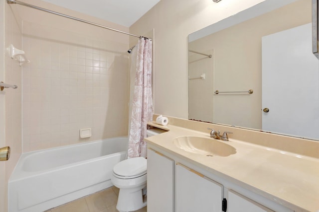 full bathroom featuring vanity, toilet, tile patterned flooring, and shower / bath combo