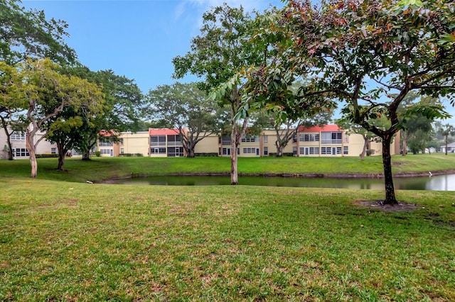 view of yard with a water view