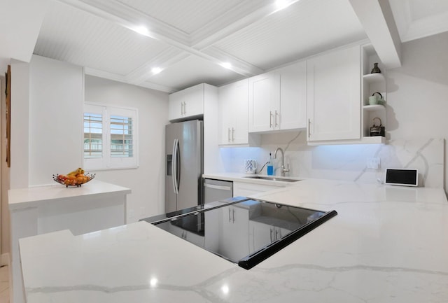 kitchen with sink, white cabinetry, coffered ceiling, beamed ceiling, and stainless steel appliances