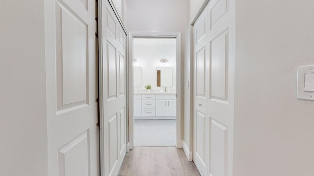 corridor featuring light hardwood / wood-style flooring